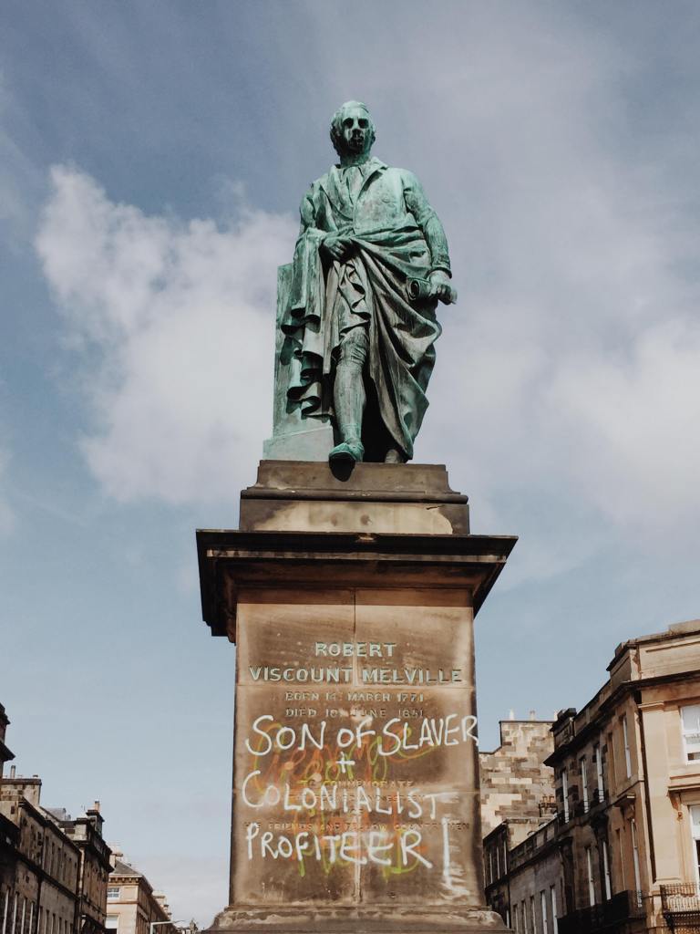 Robert Viscount Melville Statue in Edinburgh with graffiti 'son of slaver and colonialist' 'profiteer'