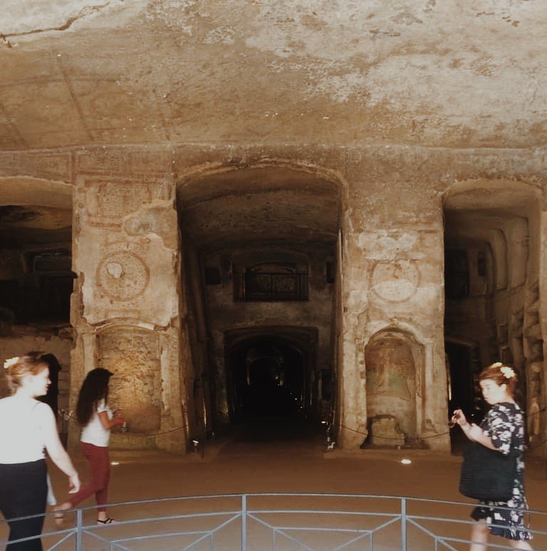 The Catacombs of San Gennaro, Naples. Image of three corridors of alcoves. 