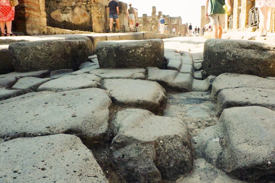 The paths at Pompeii with grooves from carriages and stepping stones.