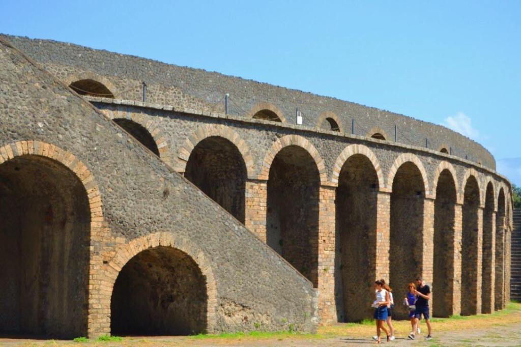 The amphitheater at Pompeii with arched entrance