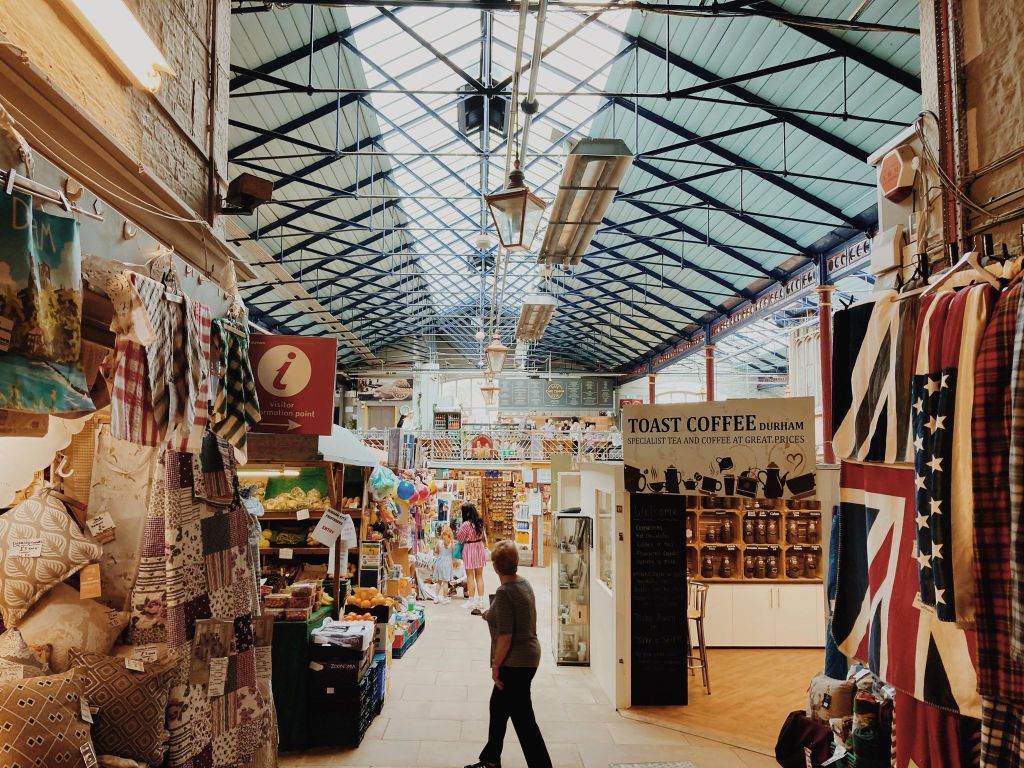 The interior of Durham Market hall with trade  stalls.