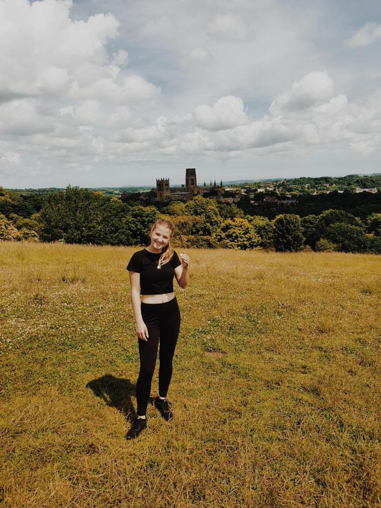 Emily (The Heritage Tourist) at the top of Observatory Hill, overlooking Durham City.