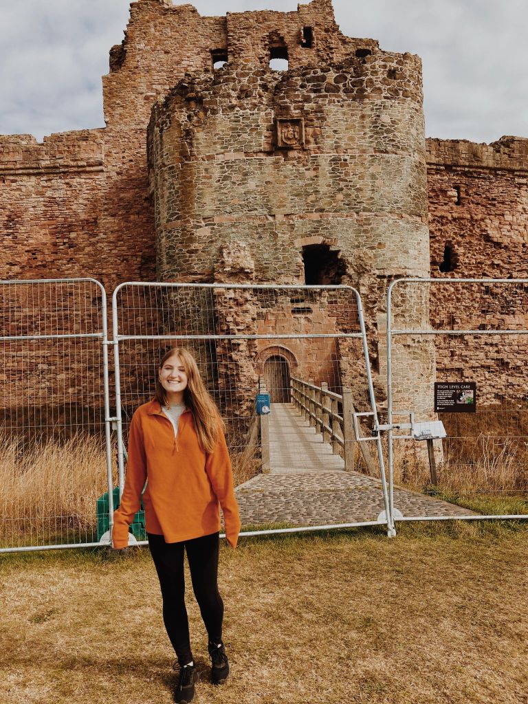 Emily (The Heritage Tourist) in front of Tantallon Castle in North Berwick 