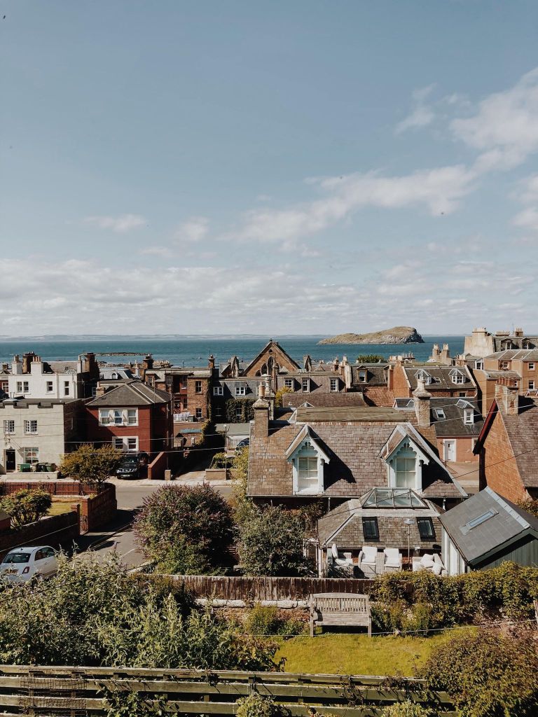 Image over looking the roof tops of North Berwick to the Firth of Forth and the Lamb