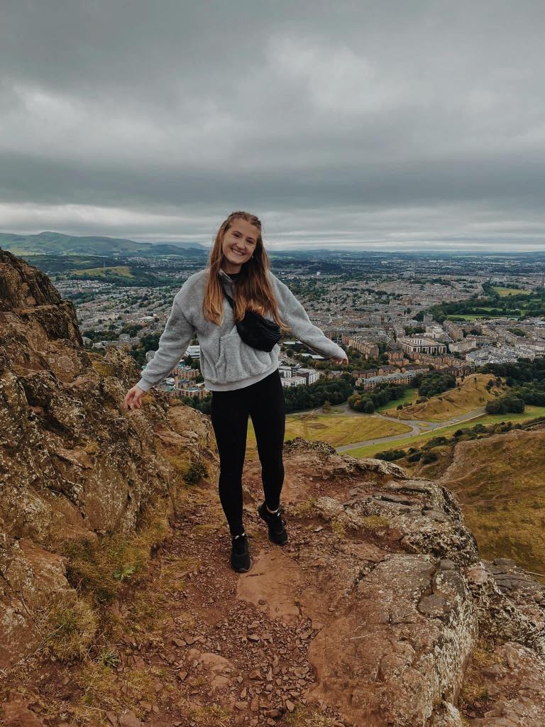The Heritage Tourist on Arthur's Seat with Edinburgh city 